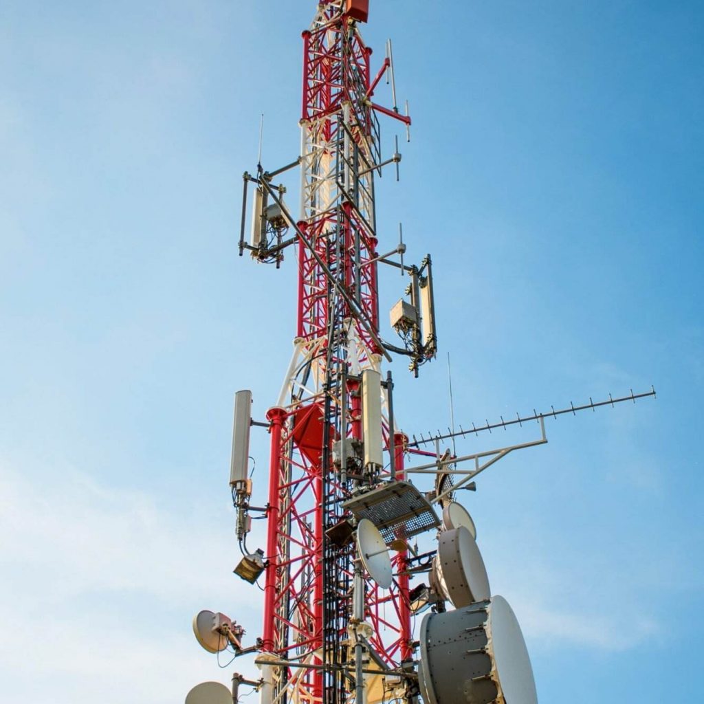 low-angle-view-of-antenna-tower-against-a-blue-sky-2021-09-01-13-42-04-utc